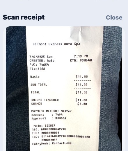 Scan receipt screen showing a photographed Vermont Express Auto Spa receipt ready to extract
